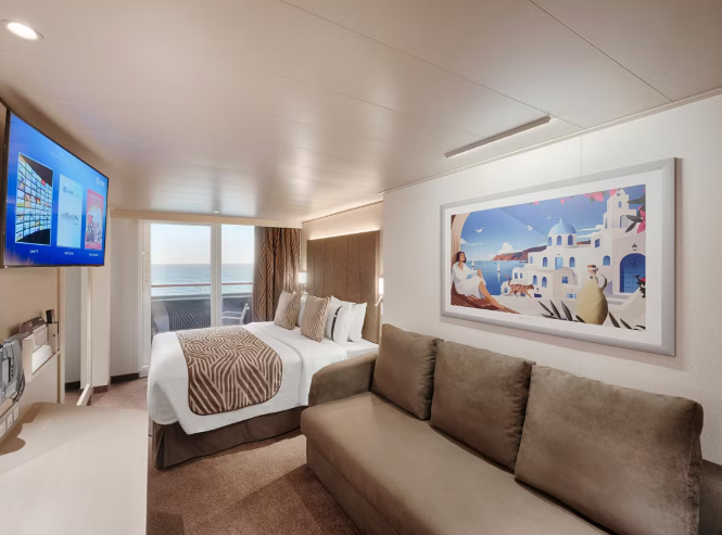 Cabine avec balcon du MSC World Asia avec lit double et canapé